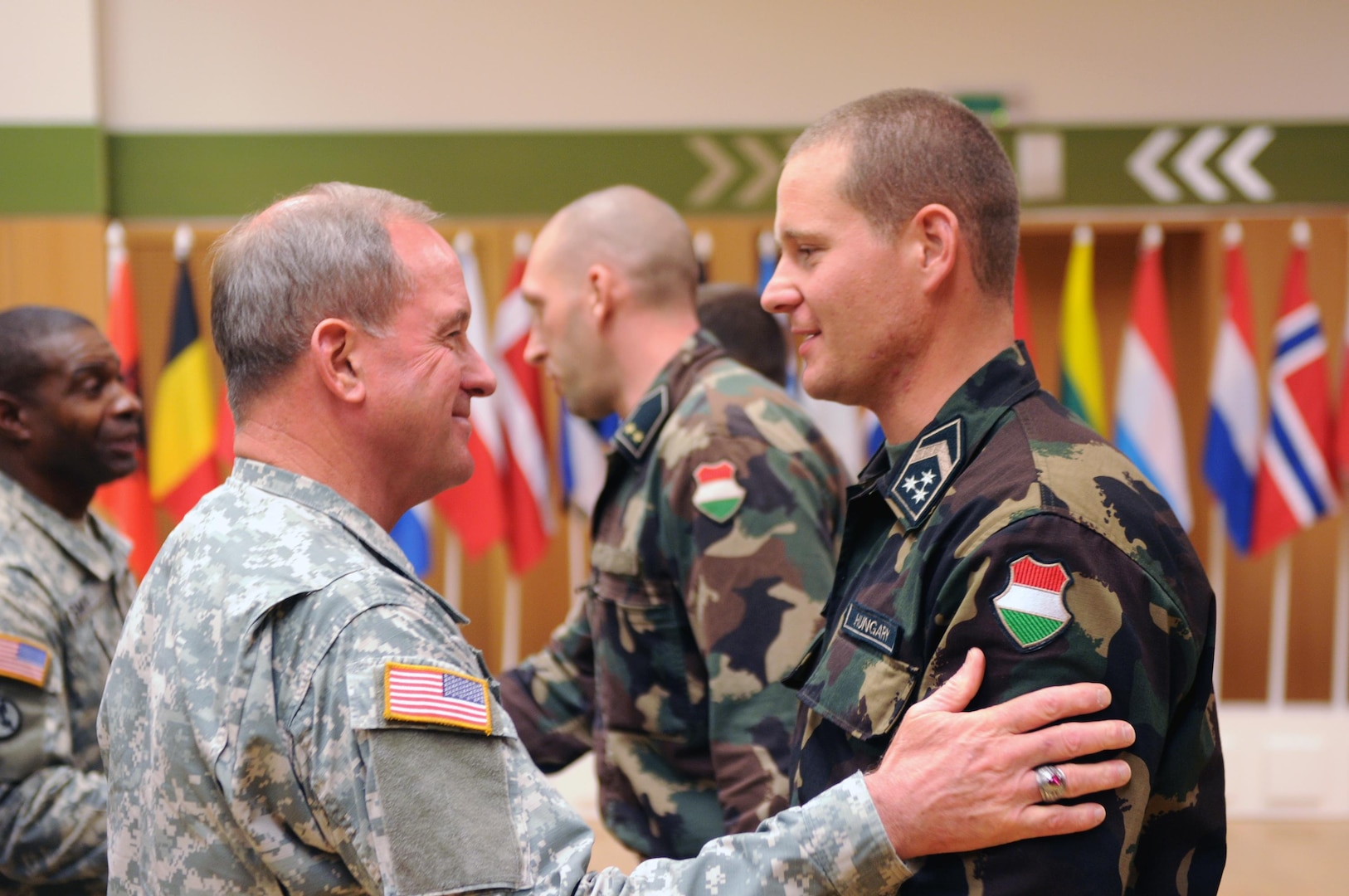 Army. Maj. Gen. Gregory Wayt, the adjutant general of the Ohio National Guard, awards the Ohio Commendation Medal to Hungarian Defense Forces soldiers who served in a joint unit with Ohio National Guard members in Afghanistan at Tata, Hungary, on Sept. 15, 2010. A delegation of Ohio National Guard leaders was in Hungary for National Guard State Partnership Program activities.