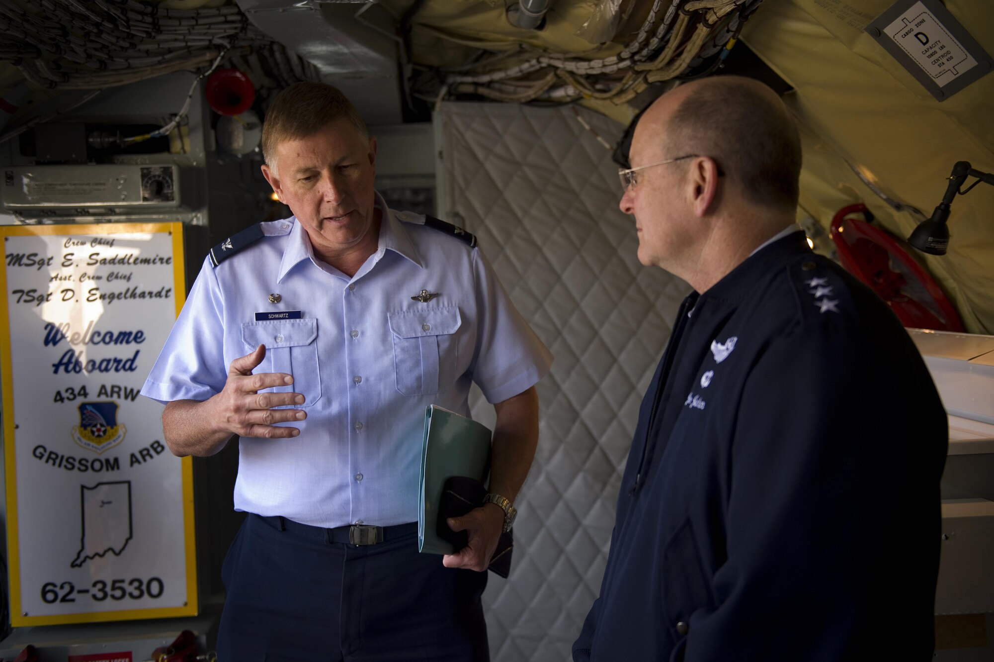 Col. Doug Schwartz, 434th Air Refueling Wing commander, discusses the wing’s mission with Lt. Gen. James Jackson, Chief of Air Force Reserve and Air Force Reserve Command commander, during a tour of a static display of a KC-135R Stratotanker at Grissom Air Reserve Base, Ind., April 17, 2015. During the tour, Jackson also visited other areas of the base to learn more about the wings mission and to thank Airmen for their contributions.  (U.S. Air Force photo/Tech. Sgt. Benjamin Mota)