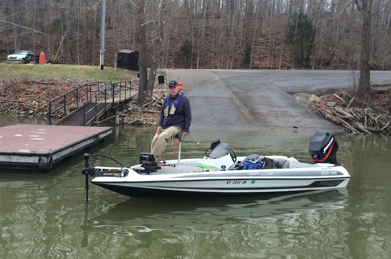 Mike Haynes sits on his boat on Lake Barkley near a boat ramp at Bumpus Mills Marina where he once had an experience where he fell off the boat without a life jacket and needed assistance getting out of the water.