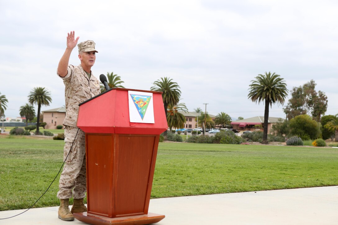 Col. John Farnam, commanding officer of Marine Corps Air Station Miramar, shares his stance on sexual assault during a ceremony closing the Sexual Assault Awareness Month Walk aboard Marine Corps Air Station Miramar, California, Apr. 20. The annual walk encourages the prevention of sexual assault and related incidents on and off the instillation. (U.S. Marine Corps photo by Sgt. Melissa Wenger/Released)