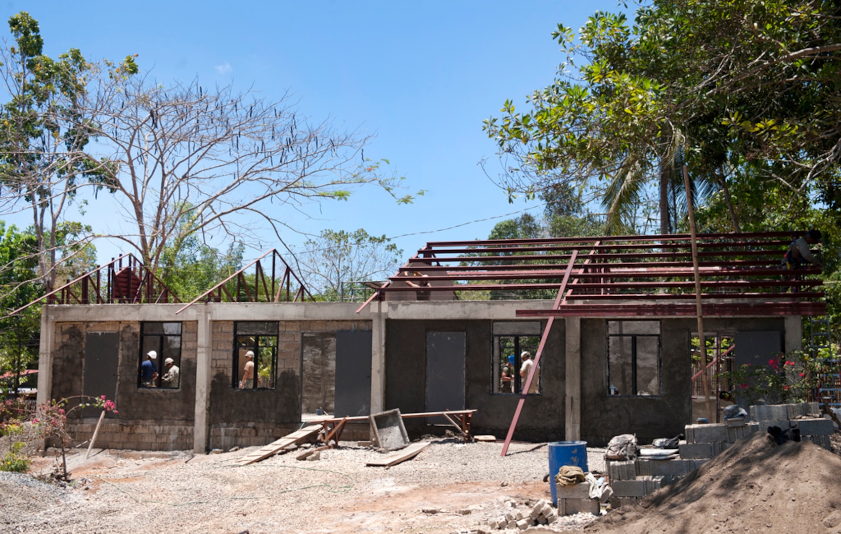 PUERTO PRINCESA, PALAWAN, Philippines (Apr. 21, 2015) - Service members of the U.S. military, Australian Army and Philippine Air Force work together to construct a two classroom Department of the Philippines Standard Building at ENCAP Site 1, Santa Lourdes National High School during exercise Balikatan.  The joint and multinational team consists of service members with the U.S. Army, U.S. Navy, U.S. Marines, Australian Army, and Philippine Air Force. This year marks the 31st iteration of the exercise, which is an annual Philippines-U.S. bilateral military training exercise and humanitarian civic assistance engagement. 