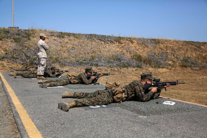 Recruits of Kilo Company, 3rd Recruit Training Battalion, aim in at their targets from the 300-yard line in the prone position, at Edson Range, Weapons and Field Training Battalion, Marine Corps Base Camp Pendleton, Calif., April 14. Primary marksman instructors teach recruits the fundamental techniques of shooting such as breathing control, stability and how to properly squeeze the trigger. Today, all male recruits recruited from recruiting stations west of the Mississippi are trained at MCRD San Diego. The depot is responsible for training more than 16,000 recruits annually. Company K is scheduled to graduate from recruit training on May 29.