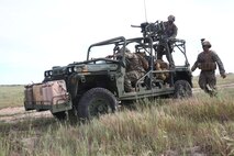 Marines with Force Company, 1st Reconnaissance Battalion, 1st Marine Division, establish radio connection with their battlefield commander during a training exercise aboard Marine Corps Base Camp Pendleton, Calif., March 16, 2015. With the information gathered by reconnaissance Marines, a battlefield commander can make properly informed decisions during a mission.