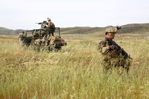 Marines with Force Company, 1st Reconnaissance Battalion, 1st Marine Division, conduct a structural integrity check on an Internally Transportable Vehicle during a training exercise aboard Marine Corps Base Camp Pendleton, Calif., March 16, 2015. Insertion with ITVs is only one of many methods  reconnaissance Marines can be inserted when conducting a mission.