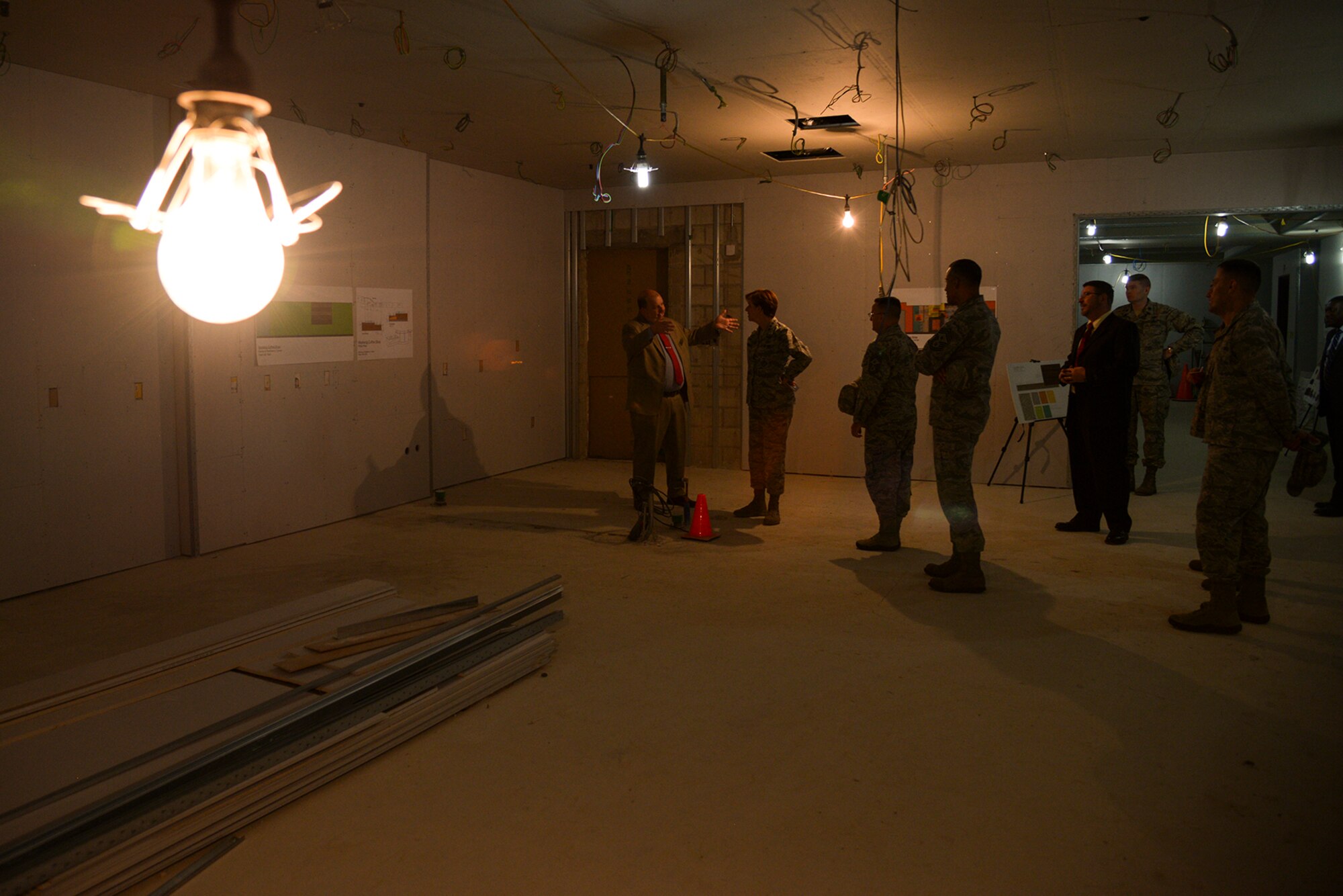 Gen. Lori Robinson, Pacific Air Force commander, gets a briefing from Anthony Chatfield, 51st Force Support Squadron deputy director, about the new coffee shop scheduled to be built in the Mustang Resiliency Center April 22, 2015, at Osan Air Base, Republic of Korea. The coffee shop is an ongoing addendum to the Mustang Resiliency Center, which is the 11th key task for Team Osan. (U.S. Air Force photo by Staff Sgt. Jake Barreiro/Released)