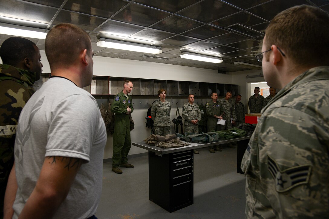 Gen. Lori Robinson (center), Pacific Air Forces commander, addresses Airmen from the 25th Aircraft Maintenance Unit April 22, 2015, at Osan Air Base, Republic of Korea. Robinson was visiting Team Osan to see its mission firsthand. (U.S. Air Force photo by Staff Sgt. Jake Barreiro/Released)
