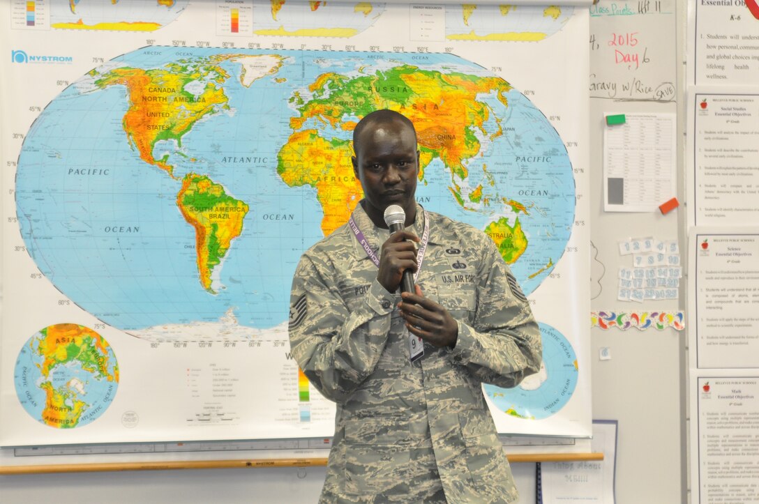 BELLEVUE, Neb. -- U.S. Air Force Tech. Sgt. Deng Pour, a chaplain’s assistant with the 55th Wing Chapel, speaks to nearly 60 Leonard Lawrence Elementary School students March 24 in Bellevue, Nebraska. He shared his personal journey of resiliency about growing up in South Sudan.