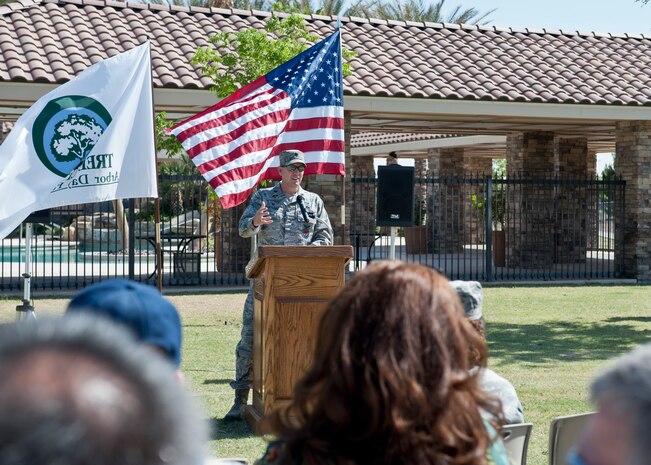 Lt. Col. Brian Hartless, 99th Civil Engineer Squadron commander, provides opening remarks during the Earth and Arbor Day 2015 celebration at Nellis Air Force Base, Nev., April 20, 2015. The annual celebration ceremony was held to show the installation is committed to the development of renewable energy through pollution-prevention efforts, energy conservation, and sustainability. (U.S. Air Force photo by Airman 1st Class Jake Carter)
