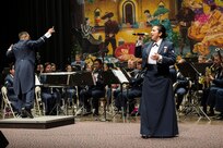 Airman 1st Class Alycia Cancel, U.S. Air Force Band of the West vocalist, sings Fiesta classics during the annual Fiesta in Blue concert April 21 at Trinity University’s Laurie Auditorium in San Antonio, Texas. The Air Force’s Band of the West is headquartered at Joint Base San Antonio-Lackland and the band has been a part of Fiesta San Antonio events for more than 20 years. The objective of the Air Force Bands program is to inspire patriotism and encourage young men and women to serve in the Air Force and other branches of the military.  The Air Force Bands Program is a family of 10 active-duty Air Force bands and five Air National Guard bands. Each band operates within its own geographic area of responsibility representing America's Airmen to a global audience. (U.S. Air Force photo by Airman 1st Class Stormy Archer/released)