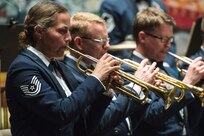 Tech. Sgt. Amy Cox, U.S. Air Force Band of the West trumpet player, performs Fiesta classics during the annual Fiesta in Blue concert April 21 at Trinity University’s Laurie Auditorium in San Antonio, Texas. The Air Force’s Band of the West is headquartered at Joint Base San Antonio-Lackland and the band has been a part of Fiesta San Antonio events for more than 20 years.  The objective of the Air Force Bands program is to inspire patriotism and encourage young men and women to serve in the Air Force and other branches of the military.  The Air Force Bands Program is a family of 10 active-duty Air Force bands and five Air National Guard bands. Each band operates within its own geographic area of responsibility representing America's Airmen to a global audience. (U.S. Air Force photo by Airman 1st Class Stormy Archer/released)