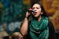 Airman 1st Class Alycia Cancel, U.S. Air Force Band of the West vocalist, sings Fiesta classics during the annual Fiesta in Blue concert April 21 at Trinity University’s Laurie Auditorium in San Antonio, Texas. The Air Force’s Band of the West is headquartered at Joint Base San Antonio-Lackland and the band has been a part of Fiesta San Antonio events for more than 20 years.  The objective of the Air Force Bands program is to inspire patriotism and encourage young men and women to serve in the Air Force and other branches of the military.  The Air Force Bands Program is a family of 10 active-duty Air Force bands and five Air National Guard bands. Each band operates within its own geographic area of responsibility representing America's Airmen to a global audience. (U.S. Air Force photo by Airman 1st Class Stormy Archer/released)