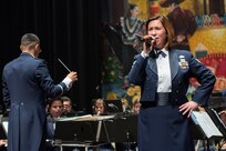 Staff Sgt. Rachel Wilson, U.S. Air Force Band of the West vocalist, sings Fiesta classics during the annual Fiesta in Blue concert April 21 at Trinity University’s Laurie Auditorium in San Antonio, Texas. The Air Force’s Band of the West is headquartered at Joint Base San Antonio-Lackland and the band has been a part of Fiesta San Antonio events for more than 20 years.  The objective of the Air Force Bands program is to inspire patriotism and encourage young men and women to serve in the Air Force and other branches of the military.  The Air Force Bands Program is a family of 10 active-duty Air Force bands and five Air National Guard bands. Each band operates within its own geographic area of responsibility representing America's Airmen to a global audience. (U.S. Air Force photo by Airman 1st Class Stormy Archer/released)