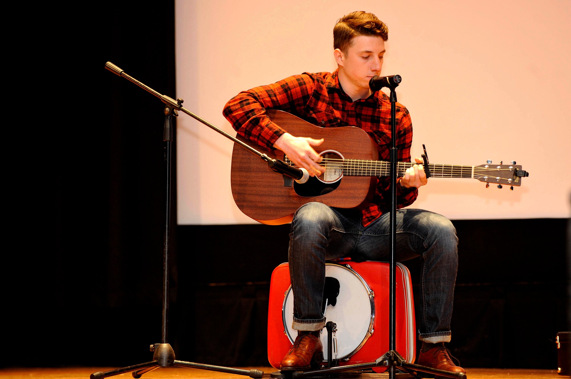 U.S Air Force Senior Airman Michael Kelley, 83rd Networks Operation Squadron technician, sang a self-written song called “Castaway” during Operation: Talent Search at Langley Air Force Base, Va., April 17, 2015. All U.S. Service members on Joint Base Langley-Eustis were invited to participate in the talent show. (U.S. Air Force photo by Senior Airman Breonna Veal/Released) 