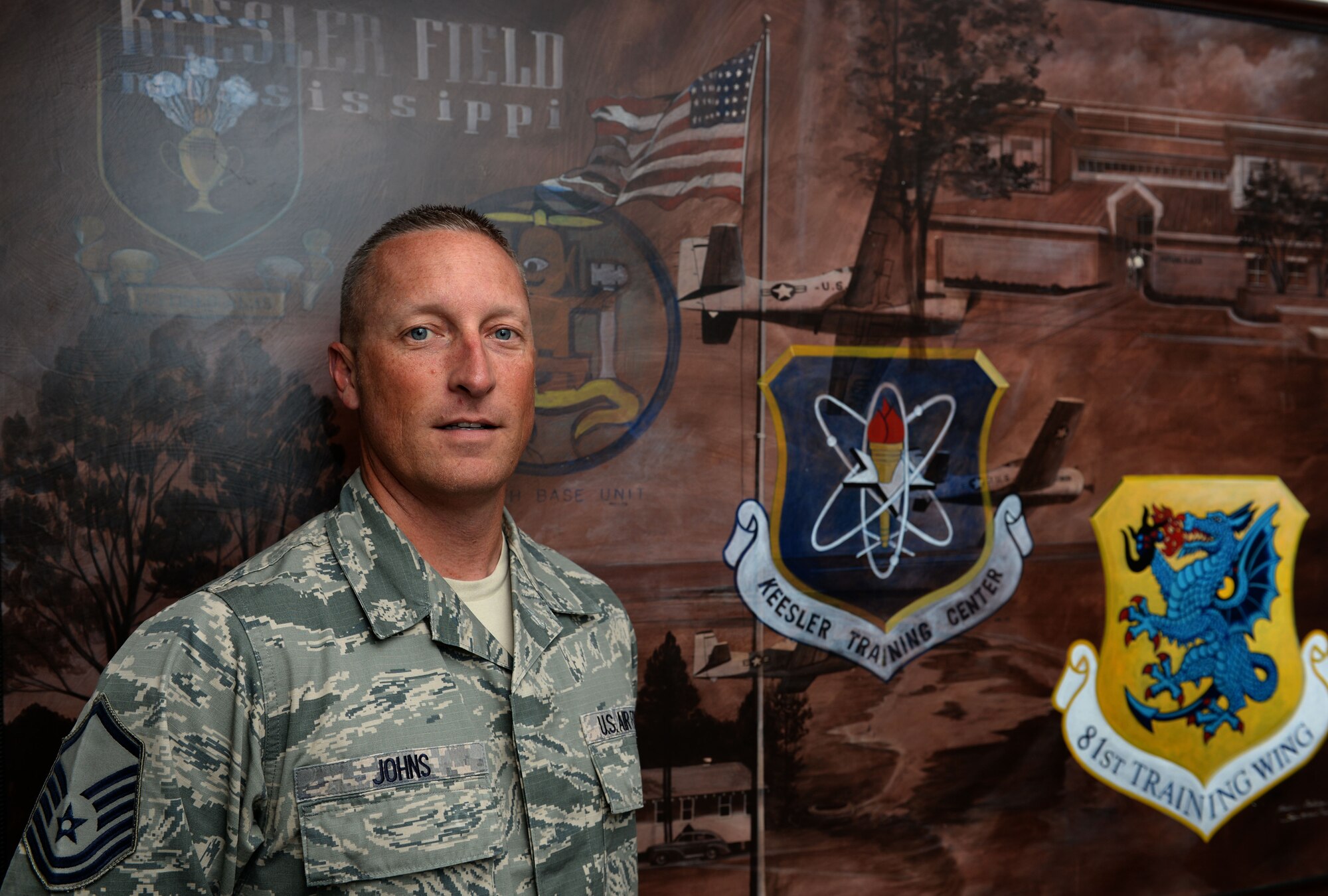 Master Sgt. Brian Johns, 81st Training Wing career assistance advisor, poses for a photo at the Airman Leadership School, April 16, 2015, Keesler Air Force Base, Miss. Johns has held this duty position since 2013. (U.S. Air Force photo by Airman 1st Class Duncan McElroy)
