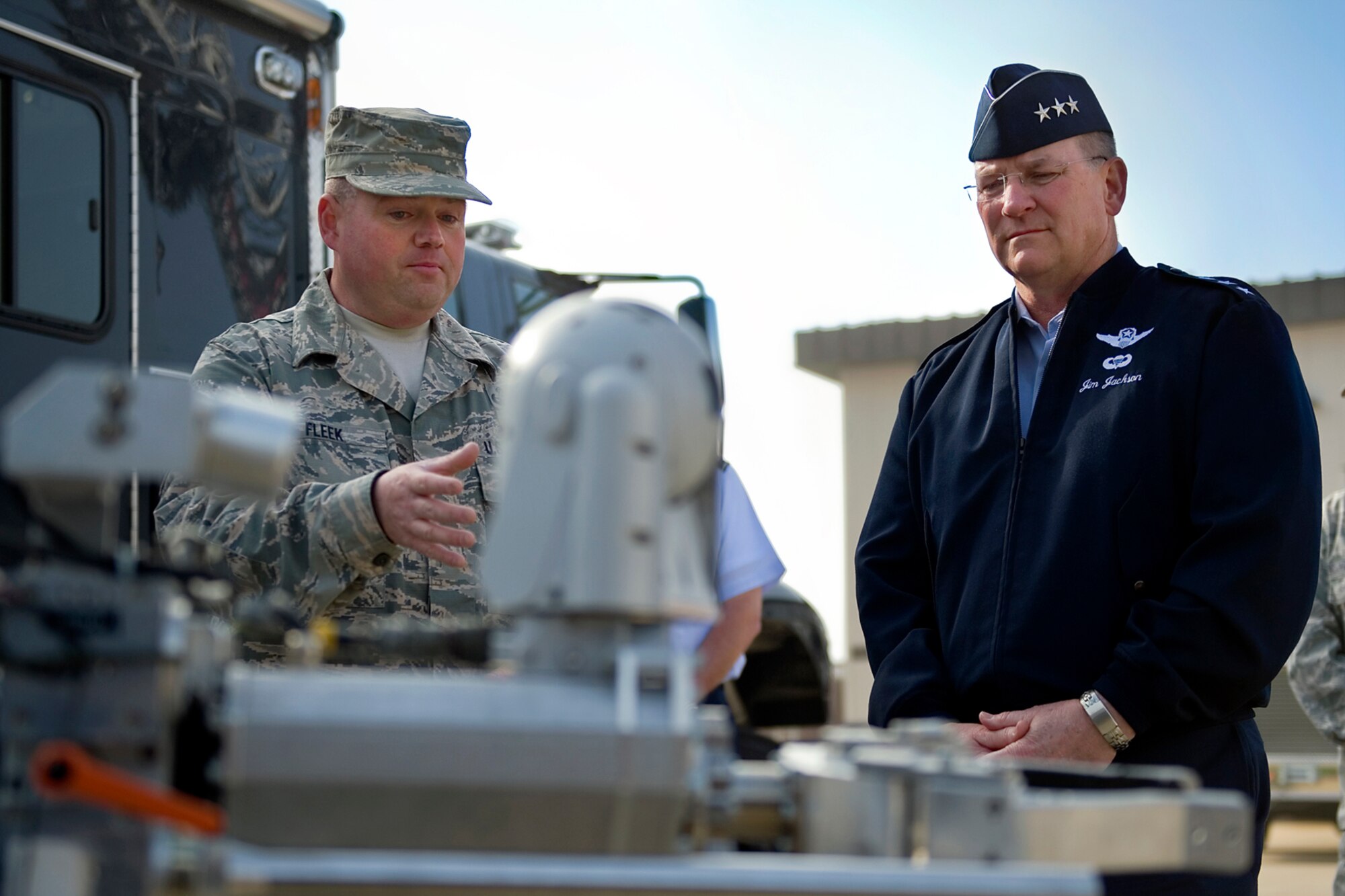 Lt. Gen. James Jackson, Chief of Air Force Reserve and Air Force Reserve Command commander, observes an Air Force medium sized robot as Senior Master Sgt. Scott Fleek, 434th Explosive Ordnance Disposal Flight superintendent, talks about his unit during a base visit at Grissom Air Reserve Base, Ind., April 17, 2015. The flight provides EOD skills to both the 434th Air Refueling Wing and the surrounding area. (U.S. Air Force photo/Tech. Sgt. Benjamin Mota)