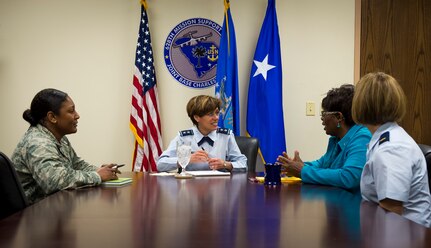 Maj. Gen. Gina Grosso, director of Air Force Sexual Assault Prevention and Response, listens to Mrs. Florine King, Joint Base Charleston SAPR program manager during a meeting April 21, 2015, at the headquarters building on Joint Base Charleston, S.C. The JB Charleston SAPR program provides 24-hours, seven-days a week sexual assault response capability for all active duty members and dependents 18 years and older. Anyone who feels they have been a victim of sexual assault may contact the appropriate office. (U.S. Air Force photo/Airman 1st Class Clayton Cupit)