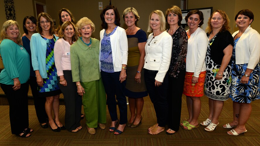 Betty Welsh, wife of Air Force Chief of Staff Gen. Mark A. Welsh III, center, poses for a photo with senior spouses after the Senior Spouses Luncheon April 17, 2015, at Moody Air Force Base, Ga. Welsh met with her husband to attend a static display of Moody aircraft after the luncheon. (U.S. Air Force photo by Airman 1st Class Kathleen D. Bryant/Released)