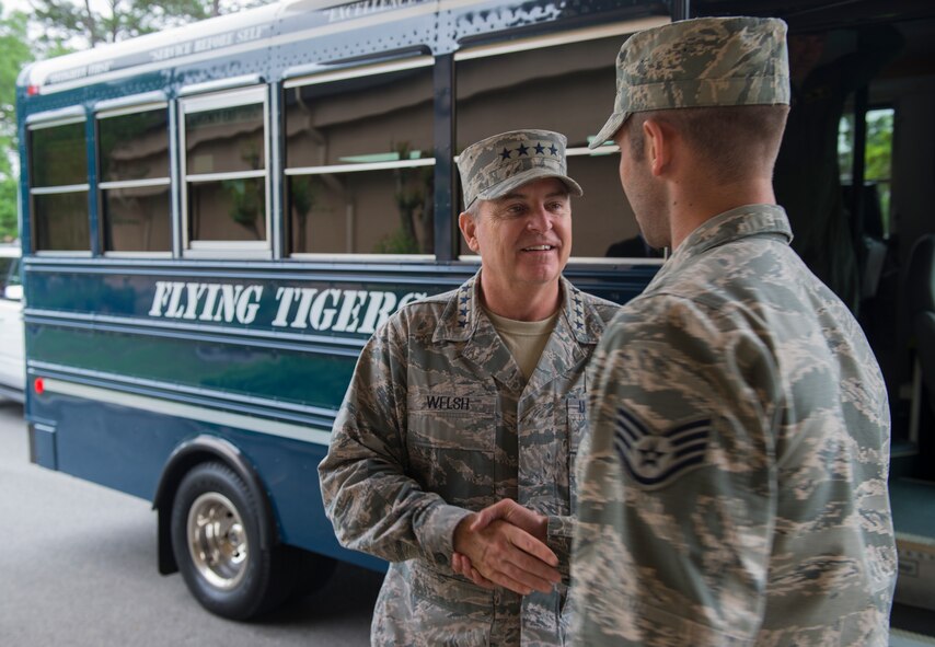 U.S. Air Force Staff Sgt. Don Beeson, 23d Aircraft Maintenance Squadron avionics technician, greets Air Force Chief of Staff Gen. Mark A. Welsh III, April 17, 2015, at Moody Air Force Base, Ga. Welsh attended breakfast with Moody Airmen and lunch with NCOs to address their concerns. (U.S. Air Force photo by Airman 1st Class Ceaira Tinsley/Released)