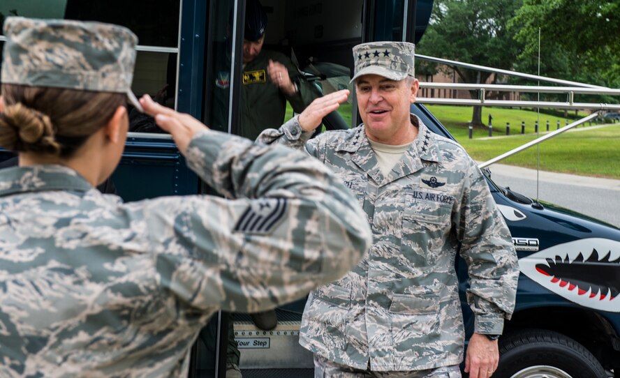 U.S. Air Force Tech. Sgt. Jewell Steamer, 41st Rescue Squadron special missions aviator, salutes Air Force Chief of Staff Gen. Mark A. Welsh III, April 17, 2015, at Moody Air Force Base, Ga. Welsh met with Moody Airmen and discussed a new retirement benefits plan, healthcare, education benefits and the future of the Air Force. (U.S. Air Force photo by Airman 1st Class Ceaira Tinsley/Released)