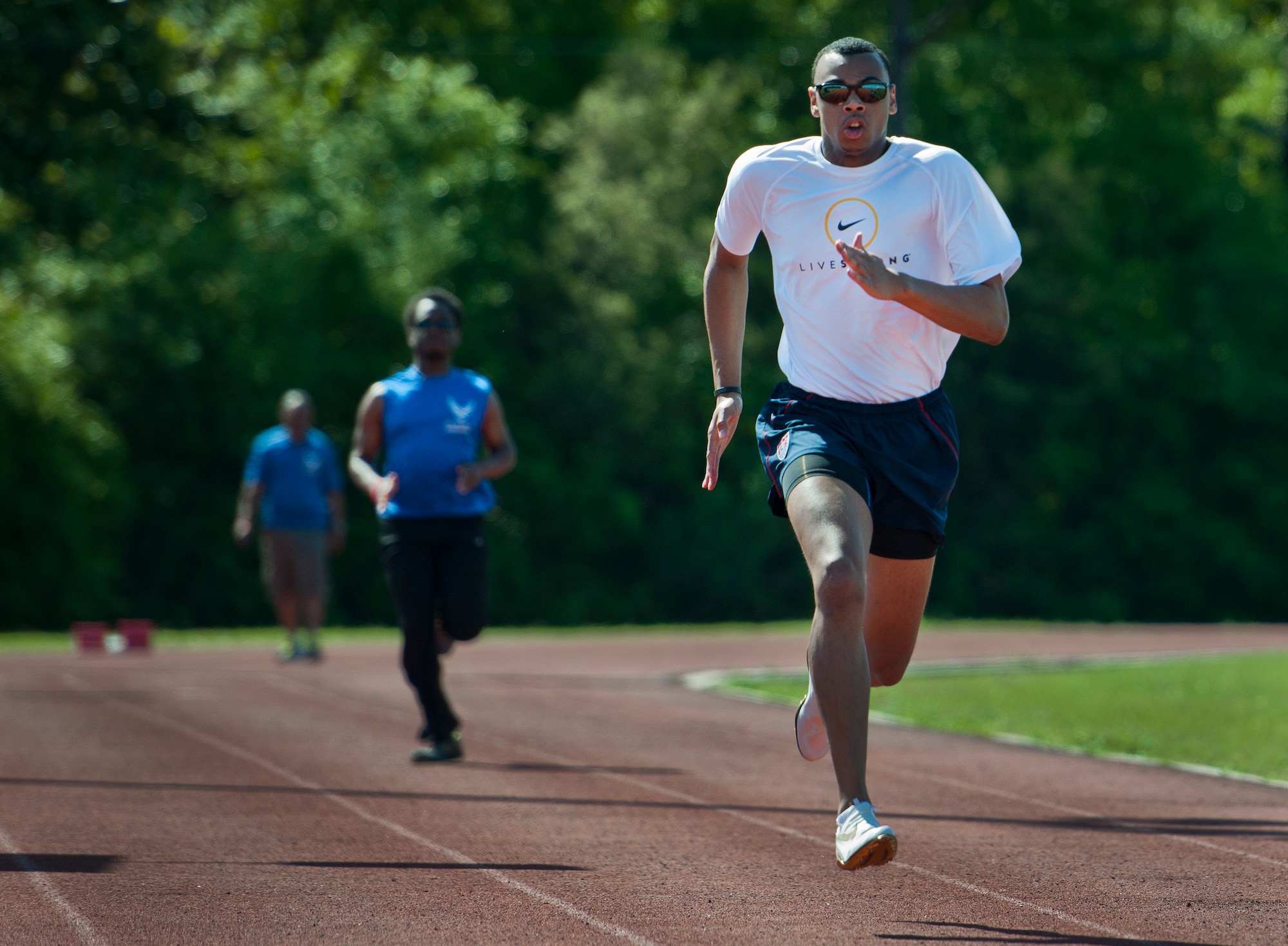 Trent Smith, an Air Force Wounded Warrior athlete, sprints the 100 meters during the fourth day of the Warrior Games training camp at Eglin Air Force Base, Fla., April 21. The five-day training camp for the Air Force’s athletes serves as their last practice session before the Warrior Games June 19-28. (U.S. Air Force photo/Samuel King Jr.)