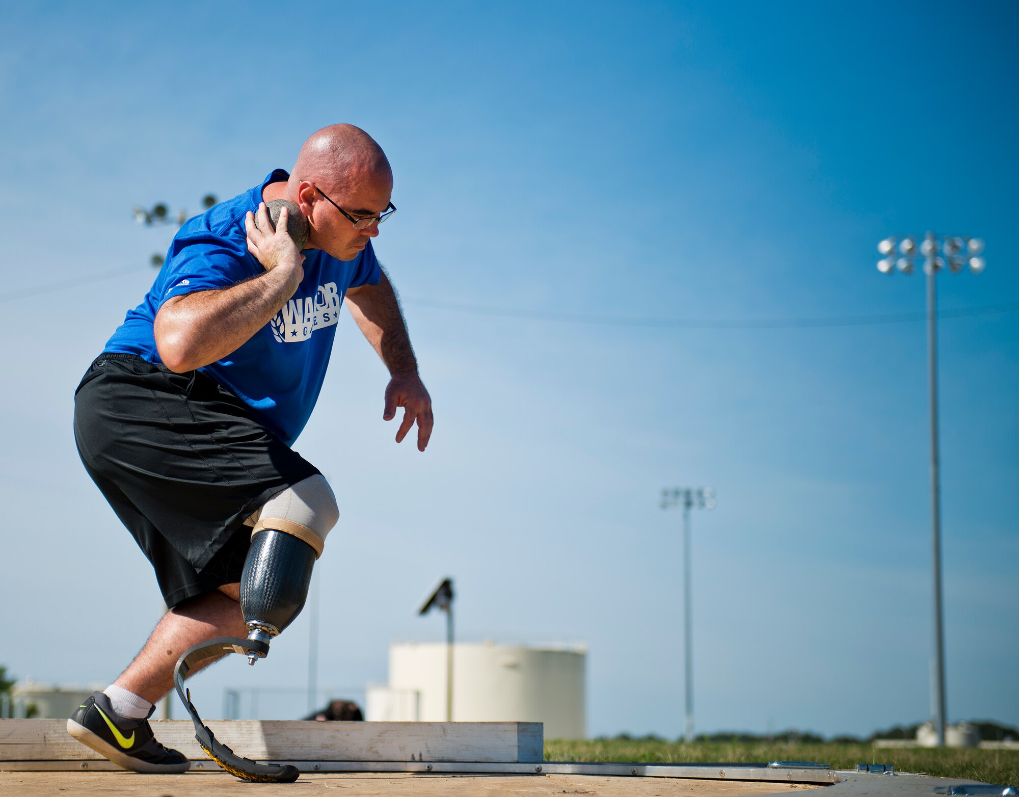 Jason Caswell, an Air Force Wounded Warrior athlete, prepares to launch his throw at a shot put practice during the fourth day of the Warrior Games training camp at Eglin Air Force Base, Fla., April 21. The five-day training camp for the Air Force’s athletes serves as their last practice session before the Warrior Games June 19-28. (U.S. Air Force photo/Samuel King Jr.)