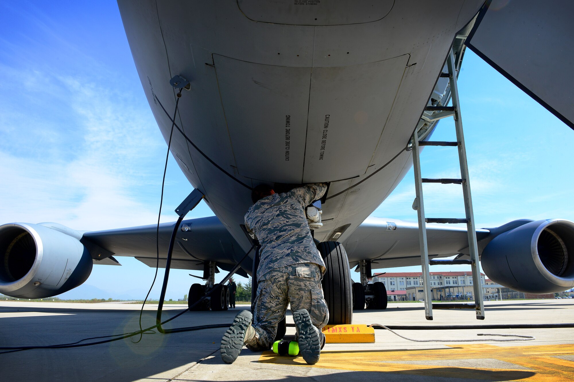 U.S. Air Force Tech. Sgt. John Sanders, 507th Air Refueling Wing from Tinker Air Force Base, Okla., Aircraft Maintenance Squadron dedicated crew chief, tightens a bolt on a KC-135 Stratotanker, April 21, 2015, at Aviano Air Base, Italy. The 507th ARW’s KC-135s allowed the 31st Fighter Wing’s F-16 Fighting Falcons to practice in-flight refueling missions. (U.S. Air Force photo by Senior Airman Matthew Lotz/Released)