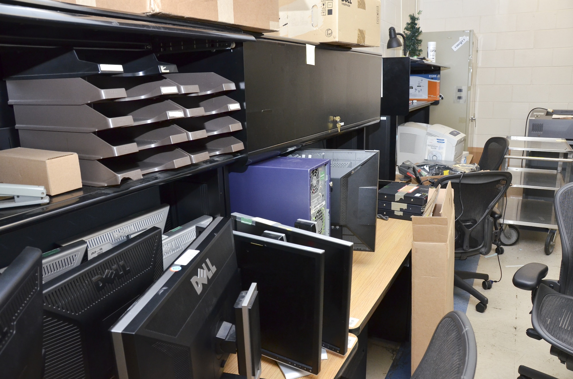 The Intelligence Squadron at the 117th Air Refueling Wing chose this IT storage room as part of a plan to clean up, organize much needed space, and work more efficiently. (U.S. Air National Guard photo by: Senior Master Sgt. Ken Johnson/Released)