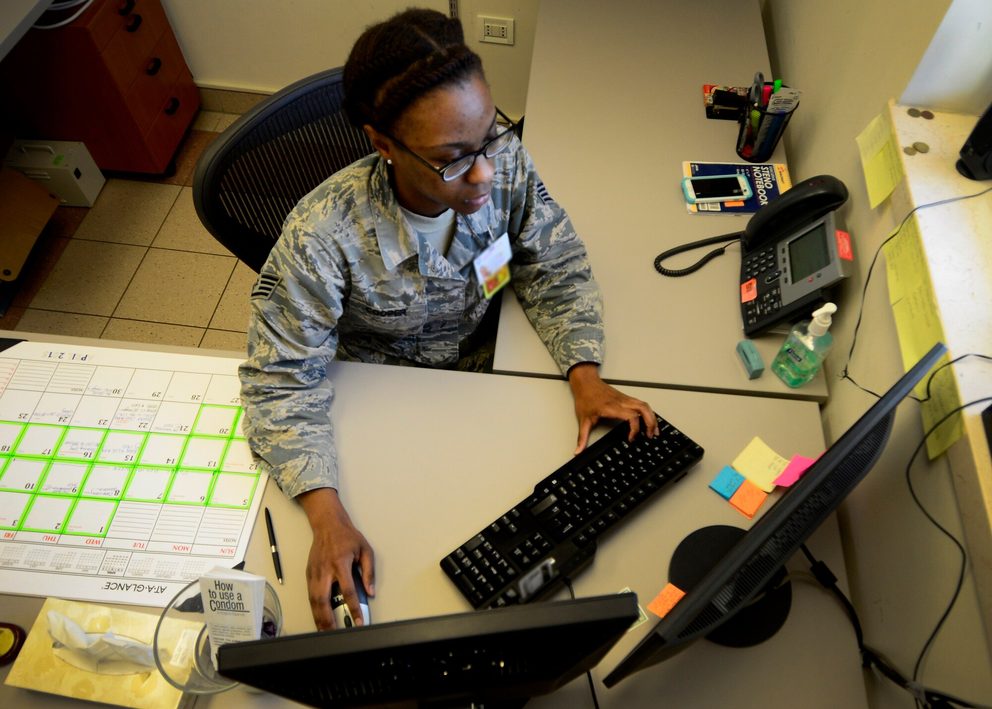U.S.  Air Force Staff Sgt. Teri Cooper, 31st Aerospace Medicine Squadron communicable disease section noncommissioned officer in charge, tracks patients, April 21, 2015, at Aviano Air Base, Italy. The communicable disease section’s goal is to recognize and control, and educate Team Aviano on transmissible diseases. (U.S. Air photo by Senior Airman Areca T. Wilson/Released)