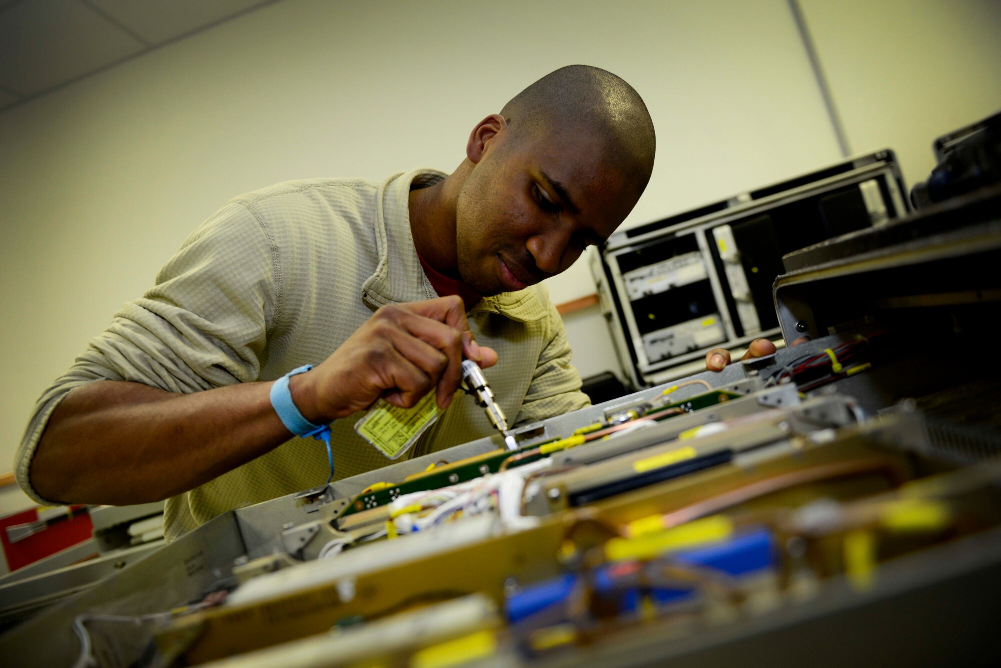 U.S. Air Force Airman 1st Class Jalen Anderson, 31st Maintenance Squadron avionics intermediate section technician, troubleshoots a test station, April 17, 2015 at Aviano Air Base, Italy. Aviano avionics technicians are responsible for troubleshooting, repairing and inspecting faulty avionics equipment on the F-16 Fighting Falcon. (U.S. Air Force photo by Senior Airman Areca T. Wilson/Released)