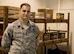 U.S. Air Force Staff Sgt. Donovan Kroeplin, 35th Maintenance Squadron munitions inspector, poses in front a supply of munitions at Misawa Air Base, Japan, April 21, 2015. As a munitions inspector, Kroeplin’s duties include receiving, identifying, inspecting and storing munitions. (U.S. Air Force photo by Airman 1st Class Jordyn Fetter/Released)