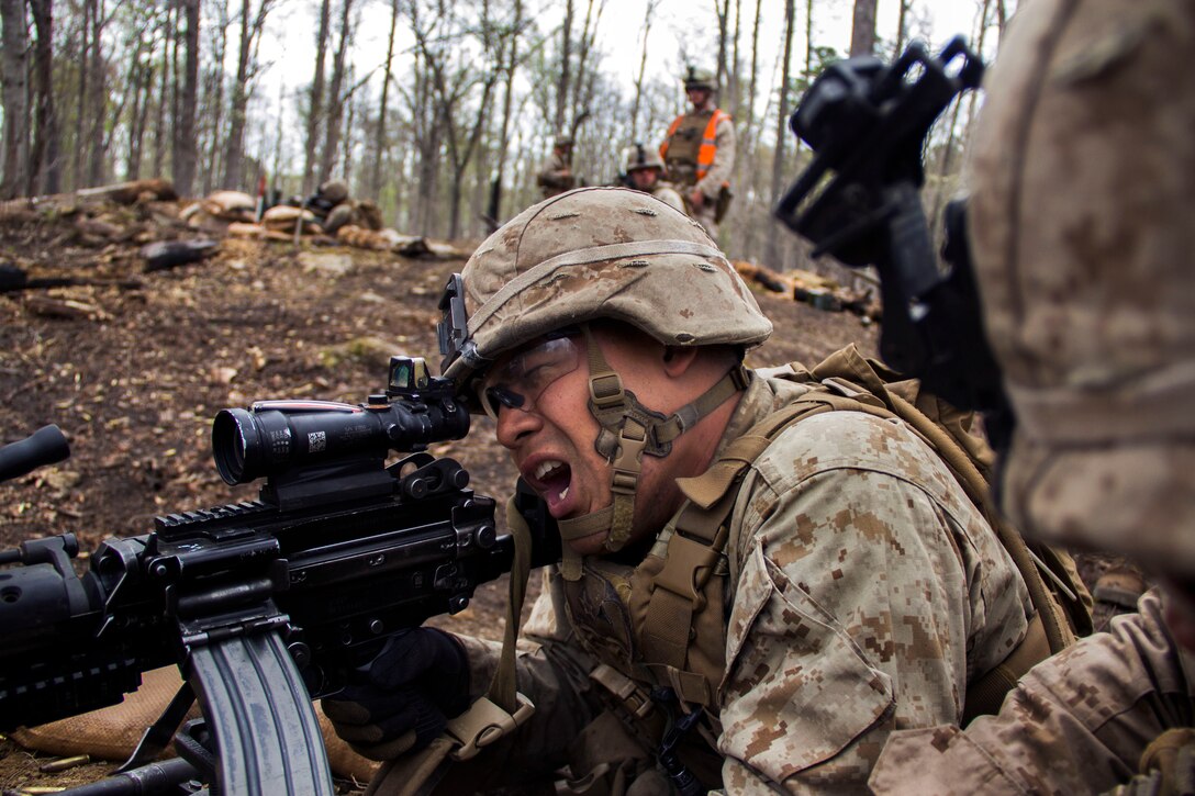 Marine Corps Lance Cpl. Rafael J. Ramirez provides suppressive fire for his squad during an exercise on Fort Pickett, Va., April 15, 2015. Ramirez is assigned to Golf Company, Battalion Landing Team, 26th Marine Expeditionary Unit.