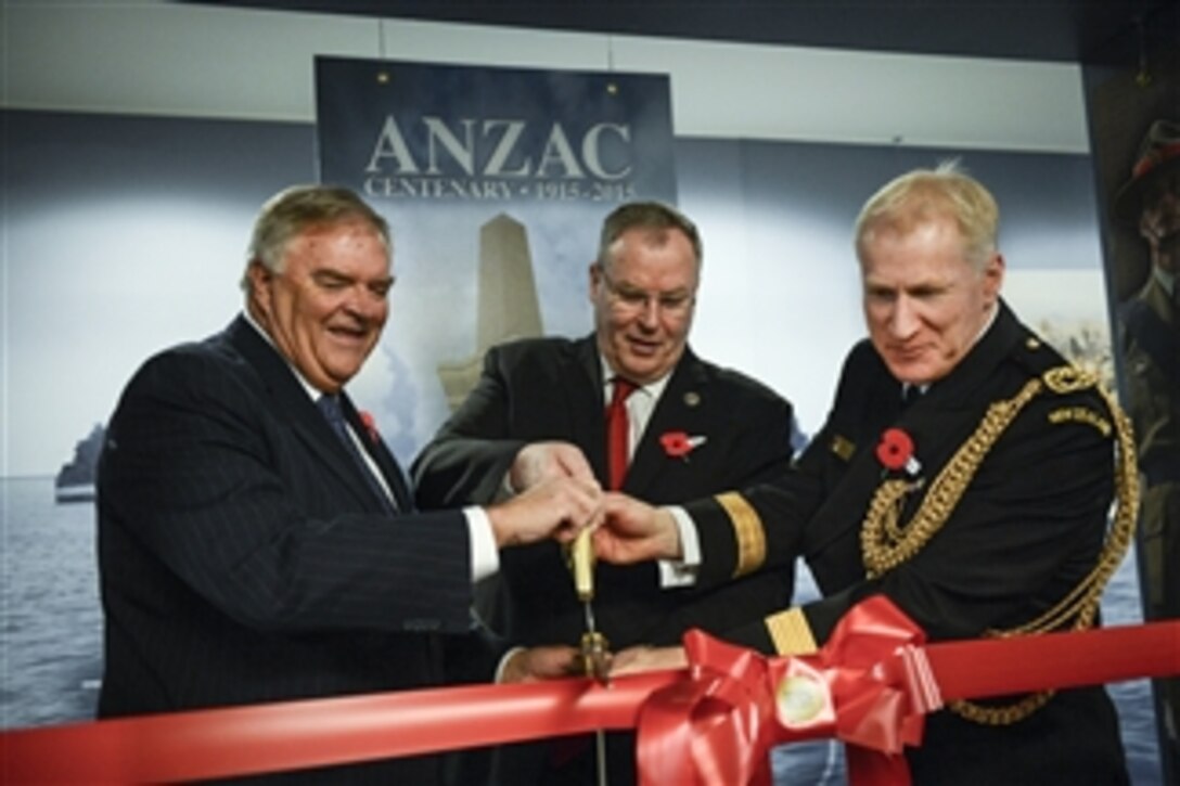 U.S. Deputy Defense Secretary Bob Work hosts a ribbon-cutting ceremony with senior officials from Australia and New Zealand in the Australia, New Zealand and United States Corridor at the Pentagon, April 22, 2015. The corridor honors the security treaty among Australia, New Zealand and the United States. The event also acknowledges Anzac Day, which commemorates the military accomplishments of the Australian and New Zealand forces, and the Battle of Gallipoli.