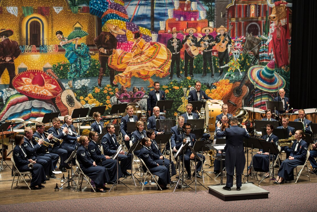 The U.S. Air Force Band of the West Concert Band performs Fiesta classics during the annual Fiesta in Blue concert April 21 at Trinity University’s Laurie Auditorium in San Antonio, Texas. The Air Force’s Band of the West is headquartered at Joint Base San Antonio-Lackland and the band has been a part of Fiesta San Antonio events for more than 20 years.  The objective of the Air Force Bands program is to inspire patriotism and encourage young men and women to serve in the Air Force and other branches of the military.  The Air Force Bands Program is a family of 10 active-duty Air Force bands and five Air National Guard bands. Each band operates within its own geographic area of responsibility representing America's Airmen to a global audience. (U.S. Air Force photo by Airman 1st Class Stormy Archer/released)