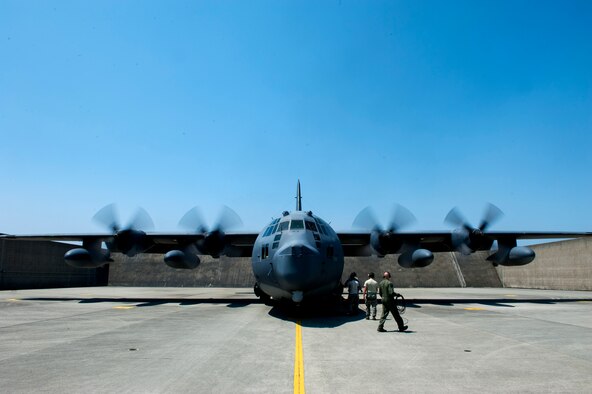 The MC-130P Combat Shadow team performs the final checks before takeoff on Kadena Air Base, Japan, April 15, 2015. The 17th Special Operations Squadron sent off the final two Combat Shadows in the Pacific Air Forces to retire to the “boneyard” at Davis-Monthan Air Force Base, Ariz. (U.S. Air Force photo/Airman 1st Class Stephen G. Eigel)