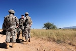 Army Maj. Gen. Peter Aylward, special assistant to the chief of the National Guard Bureau, center, speaks with Arizona Army National Guard Soldiers near Nogales, Ariz., while visitng troops serving along the Southwest border in support of U.S. Customs and Border Patrol agents, Sept. 13, 2010. Slightly more than 1,200 National Guard Soldiers and Airmen are in training or deployed to the border and will be providing administrative, logistical, engineering and other support to CBP and Immigration and Customs Enforcement agents.