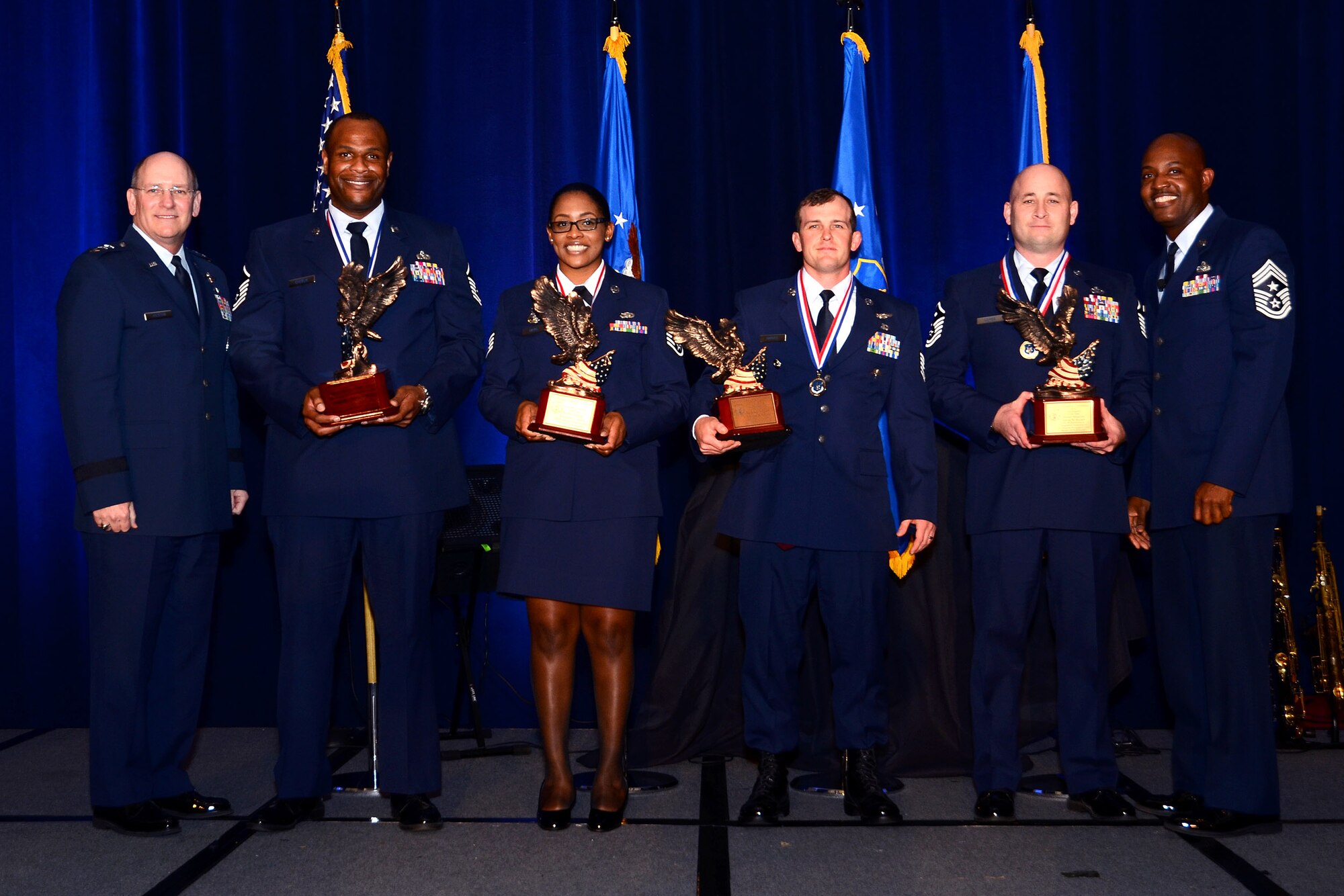 Air Force Reserve Command’s Outstanding Airman of the Year winners pose for a photo with Lt. Gen. James Jackson, AFRC commander, and Chief Master Sgt. Cameron Kirksey, AFRC command chief, during the AFRC OAY banquet at the Waverly Hotel in Atlanta, Ga., April 15, 2015. The AFRC banquet honored Citizen Airmen for the hard work and dedication. (U.S. Air Force photo/Brad Fallin)