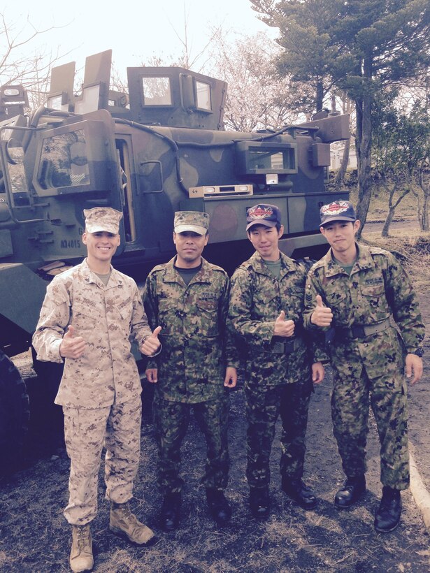 12 Apr 2015 
JGSDF Camp Takigahara, Gotemba, Shizuoka Pref.,Japan - Cpl Schihl explains the features of Camp Fuji's Cat 1, A1, MRAP to
JGSDF personnel during the Takigahara 41st Anniversary Festival.
