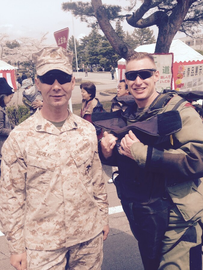 12 Apr 2015 
JGSDF Camp Takigahara, Gotemba, Shizuoka
Pref., Japan - SSgt Nicolae and SSgt Himsworth support displays of Camp
Fuji's motor transport and EOD equipment during the Takigahara 41st
Anniversary Festival.