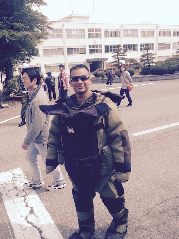 12 Apr 2015 
JGSDF Camp Takigahara, Gotemba, Shizuoka
Pref., Japan - SSgt Lopez supports a portable display of Camp Fuji's EOD
equipment during the Takigahara 41st Anniversary Festival.
