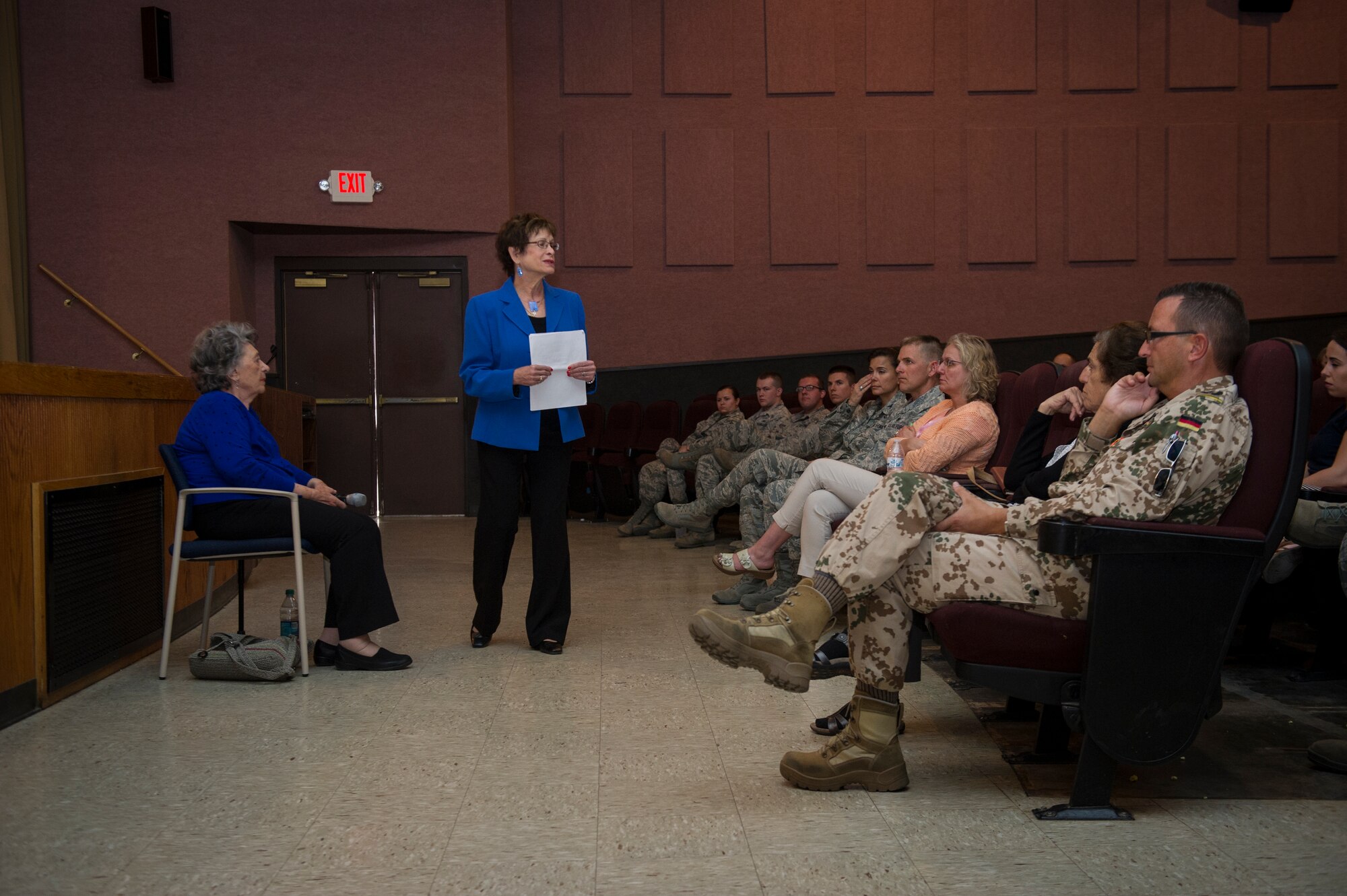 Dr. Gail Wallen, founder and director of the military holocaust education program and her guest, Lily Brull, a Holocaust survivor deliver information and life stories about experiences from the Holocaust at Holloman Air Force Base, N.M., April 21, 2015. The German Air Force and Holloman invited Wallen, Brull and Theresa Dulgov to speak to military members and a local group of advanced placement history students from Alamogordo High School. Along with her were Theresa Dulgov and Lily Brull, both Holocaust survivors. (U.S. Air Force photo by Airman 1st Class Aaron Montoya / Released)