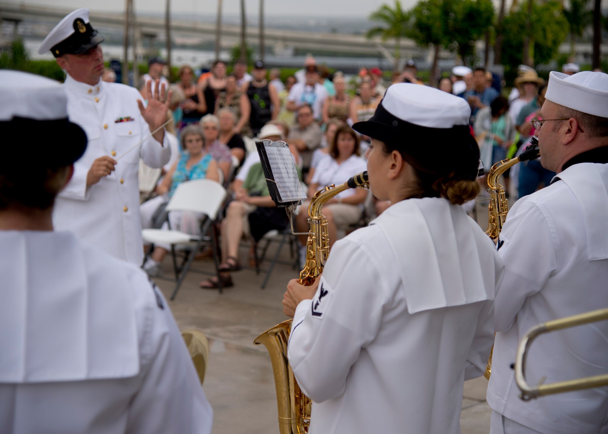 U.S. Pacific Fleet Band performs during the Pearl Harbor Colors ceremony celebrating Earth Day and National Park Week At the Pearl Harbor Visitor Center, Hawaii, April 23 2015. Pearl Harbor Colors is an opportunity for local residents and international visitors to witness a U.S. military ceremony and meet veterans, service members and their families. (U.S. Air Force photo by Tech. Sgt. Aaron Oelrich/Released)