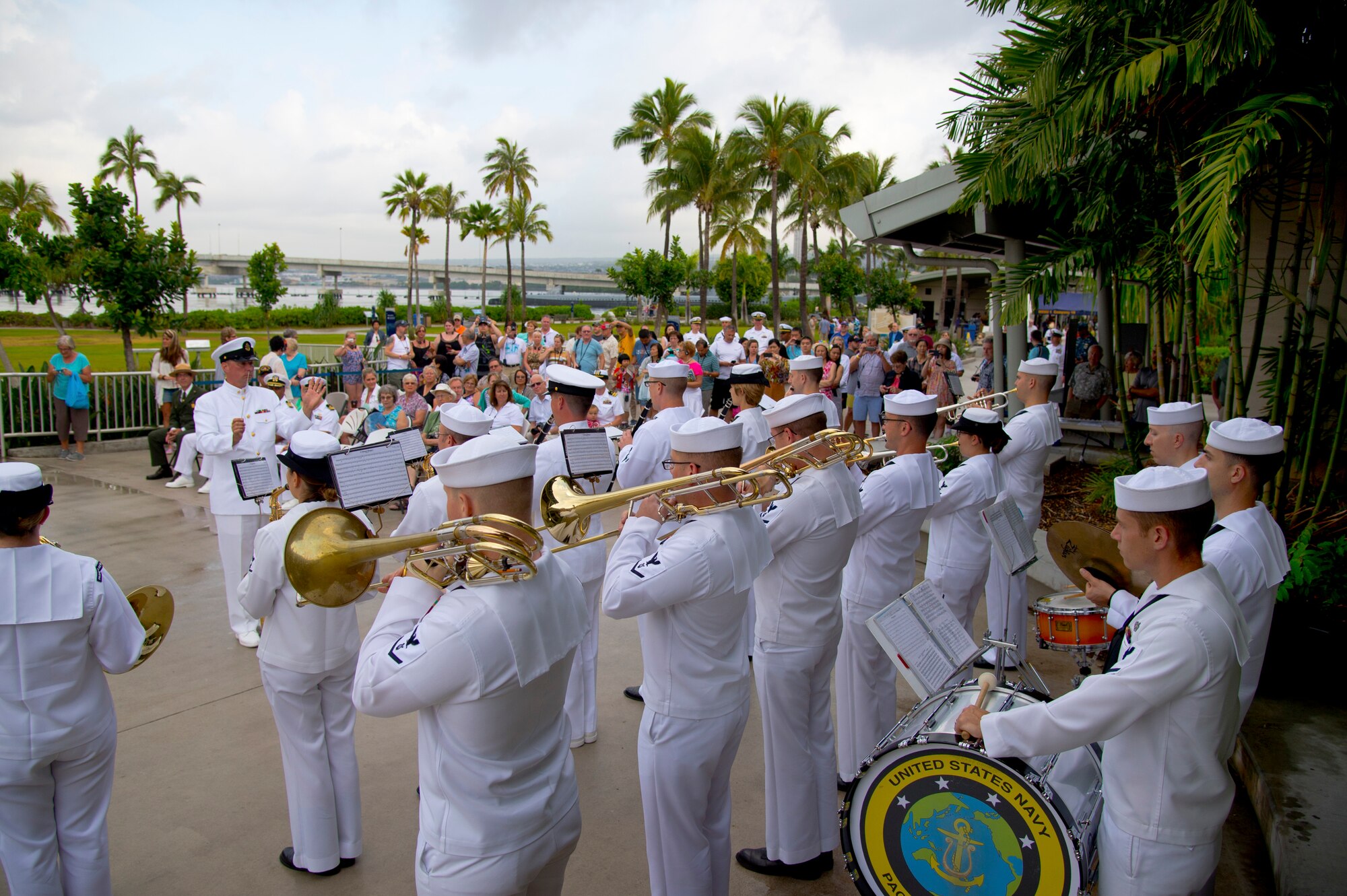 U.S. Pacific Fleet Band performs during the Pearl Harbor Colors ceremony oat the Pearl Harbor Visitor Center Hawaii, April 23 2015. The ceremony focused on the Navy’s efforts to contribute to a more sustainable environment. Additionally, the ceremony honored the National Park Service and celebrated National Park Week. (U.S. Air Force photo by Tech. Sgt. Aaron Oelrich/Released)
