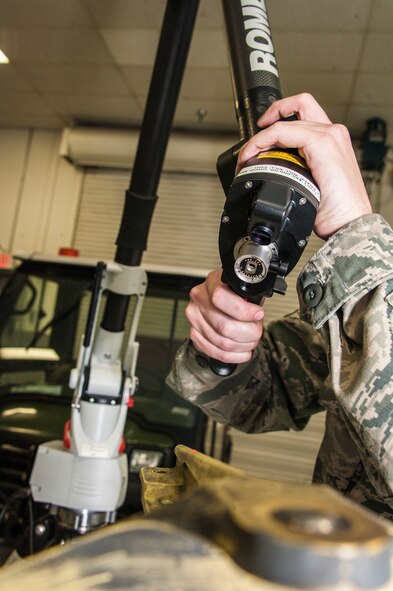 Tech. Sgt. Gregory Kirchner, 92nd Maintenance Squadron aircraft metals technology craftsman, scans a KC-135 Stratotanker part with the unit’s new 3-D laser imaging arm March 25, 2015, at Fairchild Air Force Base, Wash. This machine brings Fairchild up to par with the civilian machining world enabling the base to efficiently produce the best possible parts needed for maintaining air power around the world. (U.S. Air Force photo/Staff Sgt. Benjamin W. Stratton)