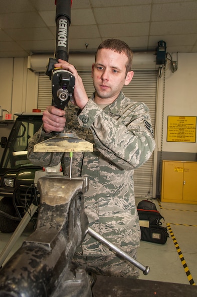 Tech. Sgt. Gregory Kirchner, 92nd Maintenance Squadron aircraft metals technology craftsman, scans a KC-135 Stratotanker part with the unit’s new 3-D laser imaging arm March 25, 2015, at Fairchild Air Force Base, Wash. The reverse engineering aspect of the ROMER Absolute Arm is extremely crucial as many parts needed to keep the KC-135 mission-capable are no longer made and with aircraft boneyards running out of spare useable parts, this technology’s importance couldn’t be timelier. (U.S. Air Force photo/Staff Sgt. Benjamin W. Stratton)