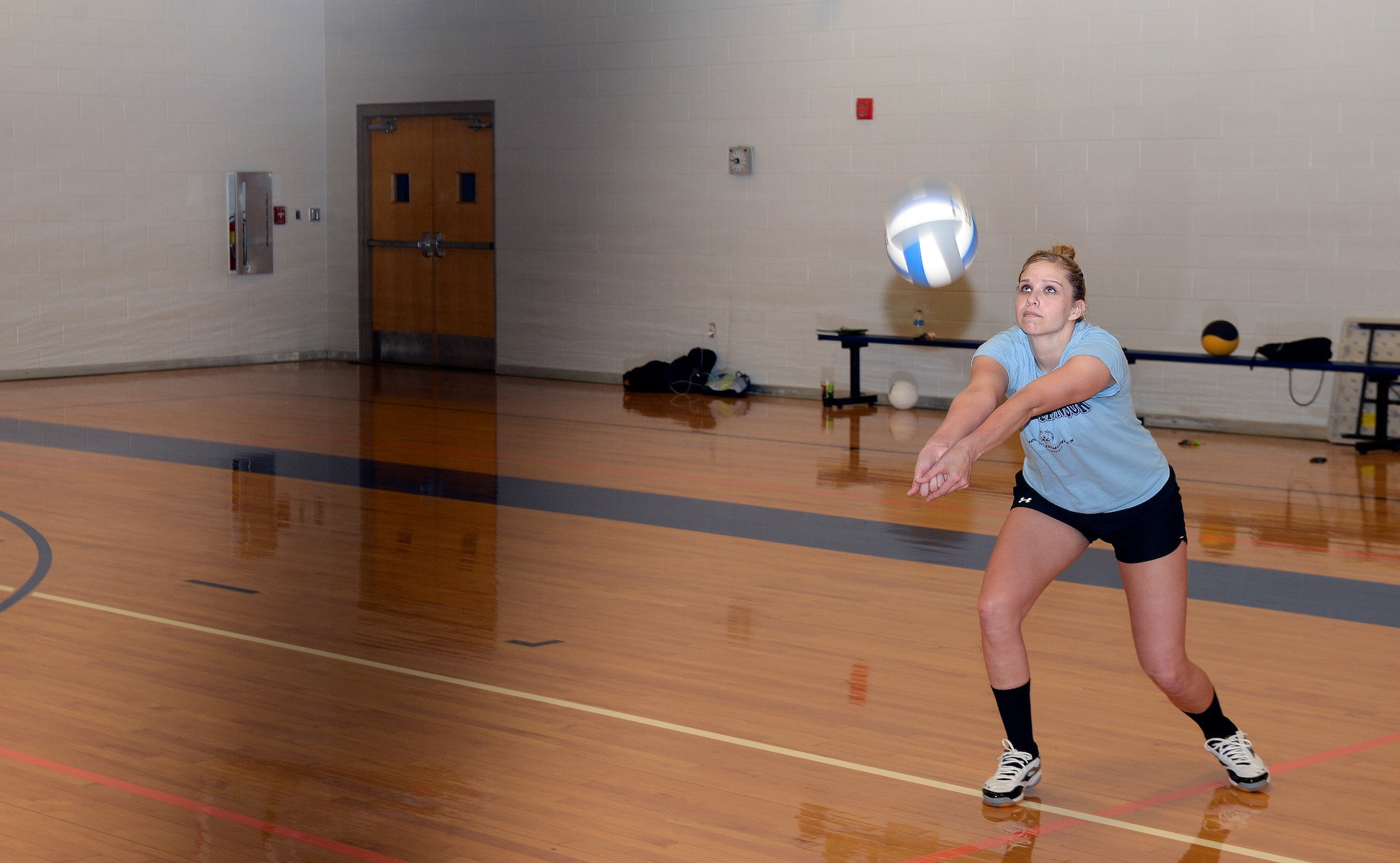 Airman 1st Class Abby Neel, 384th Air Refueling Squadron commander’s support staff, bumps a volleyball during practice April 20, 2015, at McConnell Air Force Base, Kan. Neel was selected to attend the All-Air Force Women’s Volleyball Camp this upcoming May. (U.S. Air Force photo by Senior Airman Colby L. Hardin)