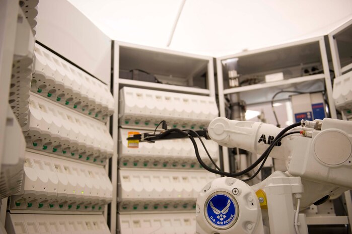 The robotic dispensing system, “Robby”, fills a prescription at the satellite pharmacy on Nellis Air Force Base, Nev., April 17, 2015. Robby allows for one pharmacy technician to execute the work of three. (U.S. Air Force photo by Airman 1st Class Rachel Loftis)