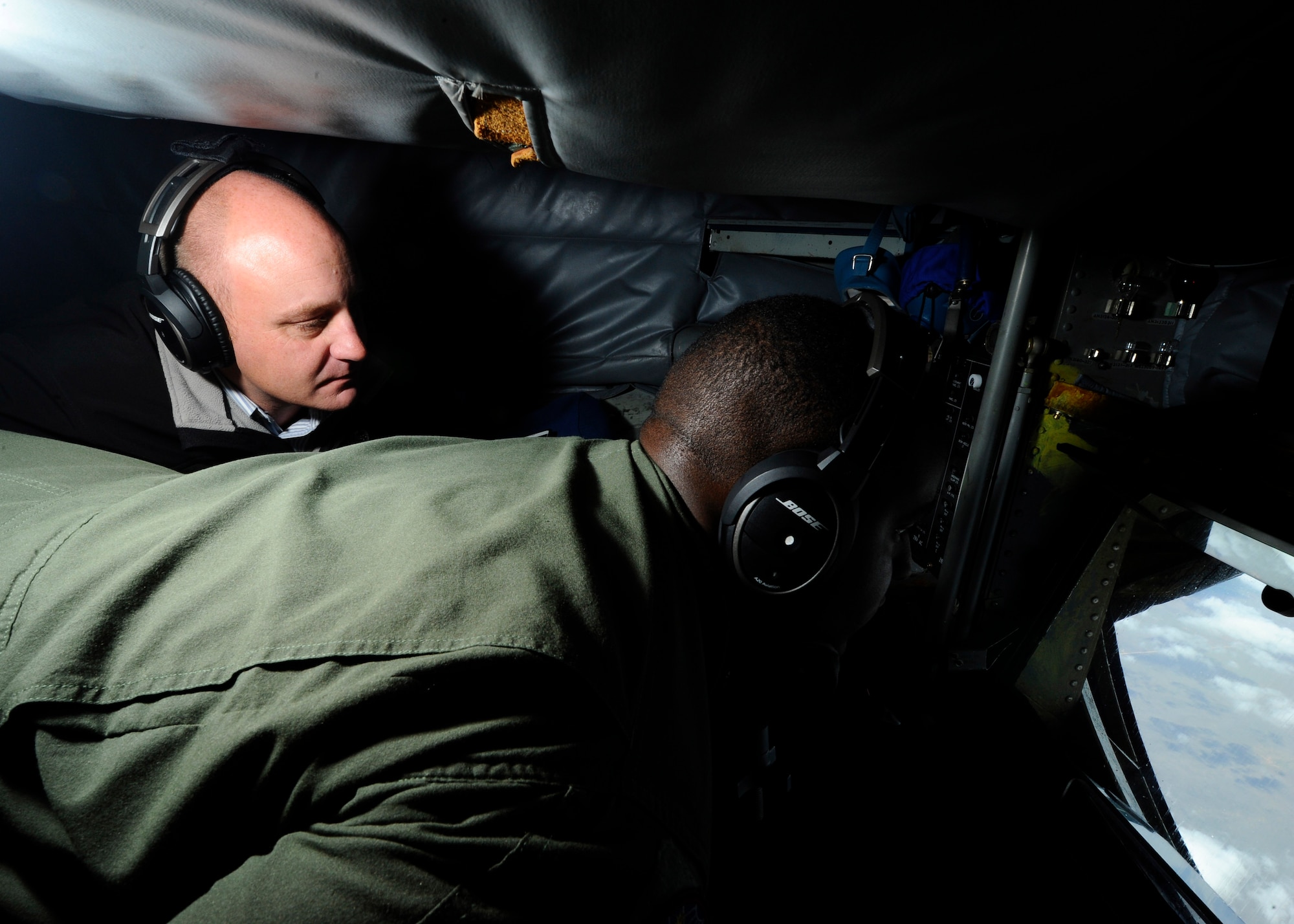James Havers-Strong, 931st Air Refueling Group honorary commander and The Aviation Business International Group of Companies CEO and managing director, watches as Staff Sgt. Malcom Lee, 22nd Operations Support Squadron operational support training NCO in charge, refuels a B-52 Stratofortress, April 23, 2015, over New Mexico. Havers-Strong was one of 15 local civic leaders on the flight who witnessed the 22nd Air Refueling Wing and 931st Air Refueling Group mission first-hand. (U.S. Air Force photo by Senior Airman Victor J. Caputo)