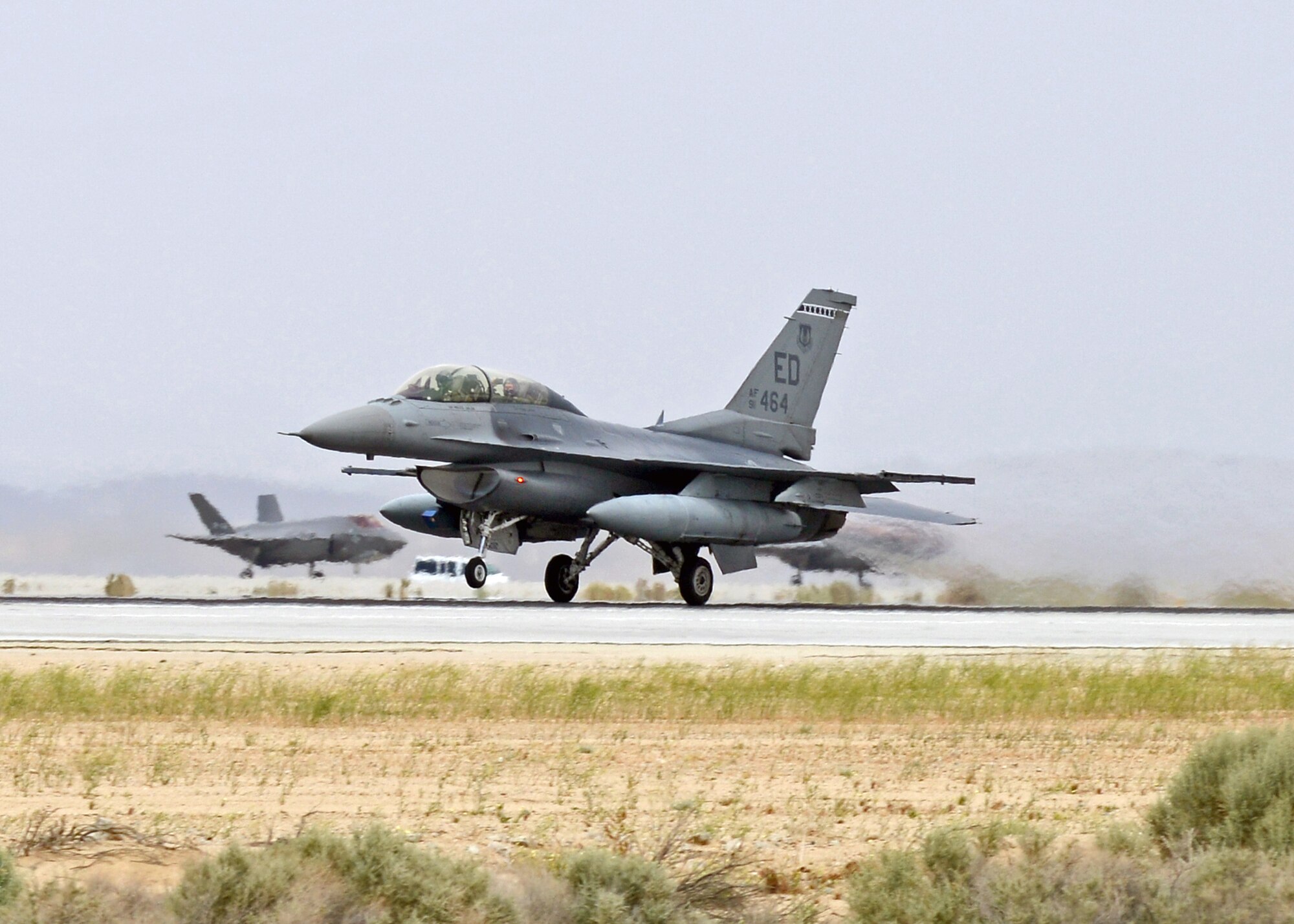 Steve Rainey (front seat), Lockheed Martin F-22 chief test pilot, and William Freckleton, 412 Range Squadron lead F-22 range control officer, take off Edwards Runway 22L in an F-16D for Freckleton’s incentive flight that occurred April 21. Freckleton is the only decorated Vietnam veteran at the 411th Flight Test Squadron with 117 combat missions, one MiG-17 kill, 1,100 flight hours in the F-4 and 1,300 hours in the F-14, and 357 aircraft carrier landings who is retiring this year after more than 40 years of combined military and government civilian service. (U.S. Air Force photo by Jet Fabara)