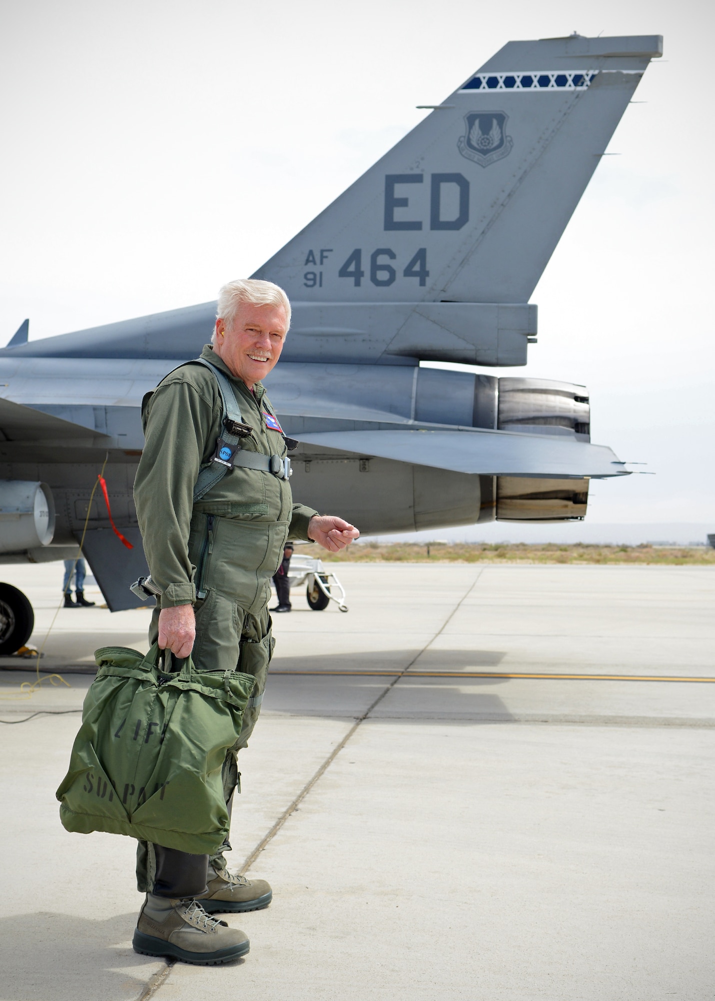 William Freckleton, 412 Range Squadron lead F-22 range control officer, poses before his F-16D incentive flight April 21. Freckleton is the only decorated Vietnam veteran at the 411th Flight Test Squadron with 117 combat missions, one MiG-17 kill, 1,100 flight hours in the F-4 and 1,300 hours in the F-14, and 357 aircraft carrier landings who is retiring this year after more than 40 years of combined military and government civilian service. (U.S. Air Force photo by Jet Fabara)