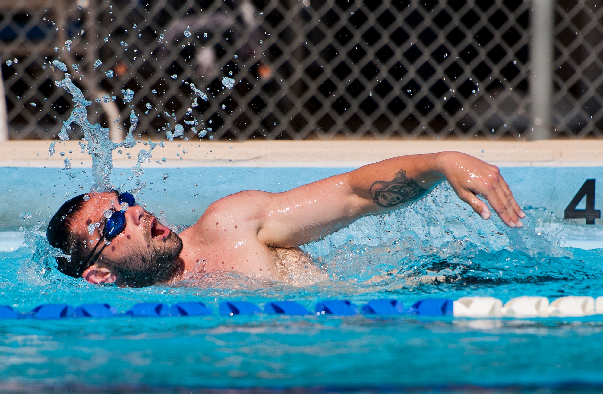 Nick Dadgoster, an Air Force Wounded Warrior athlete, swims laps during the final day of the Warrior Games training camp at Eglin Air Force Base, Fla., April 22. The five-day training camp for the Air Force’s athletes serves as their last practice session before the Warrior Games June 19-28. (U.S. Air Force photo/Samuel King Jr.)